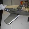 Another view of Tom's P-39. Prop is a repitched 8" Peck prop with a ramp freewheeler swung by 3 loops of 1/8" with a hook to peg length of about 2X.