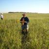 SCAMPSter Fernando Ramos getting ready to launch in the wet morning grass.