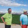 Mike Jester looks out over the field as Henry readies his glider for some downwind flying.