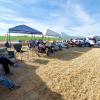 With flying over, everyone gathers in front of the HQ tent for the ending ceremonies.