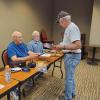 Don Bartick submits his SE5a to the cheerful judging staff