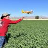 Bob Hodes launches his 24” span Shoestring racer for a test flight.  Built from a P.T. Aviation short kit - Mike Kelly photo