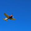 Mike Kelly’s 30” span “Lucky Gallon” Corsair cruises overhead during the Modern Unlimited Racer mass launch - Mike Kelly photo