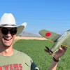 WWII Mass Launch Winner and WestFAC 2023 Grand Champion Jonathan Nunez smiles holding his winning Diels Aichi Grace - Mike Kelly photo